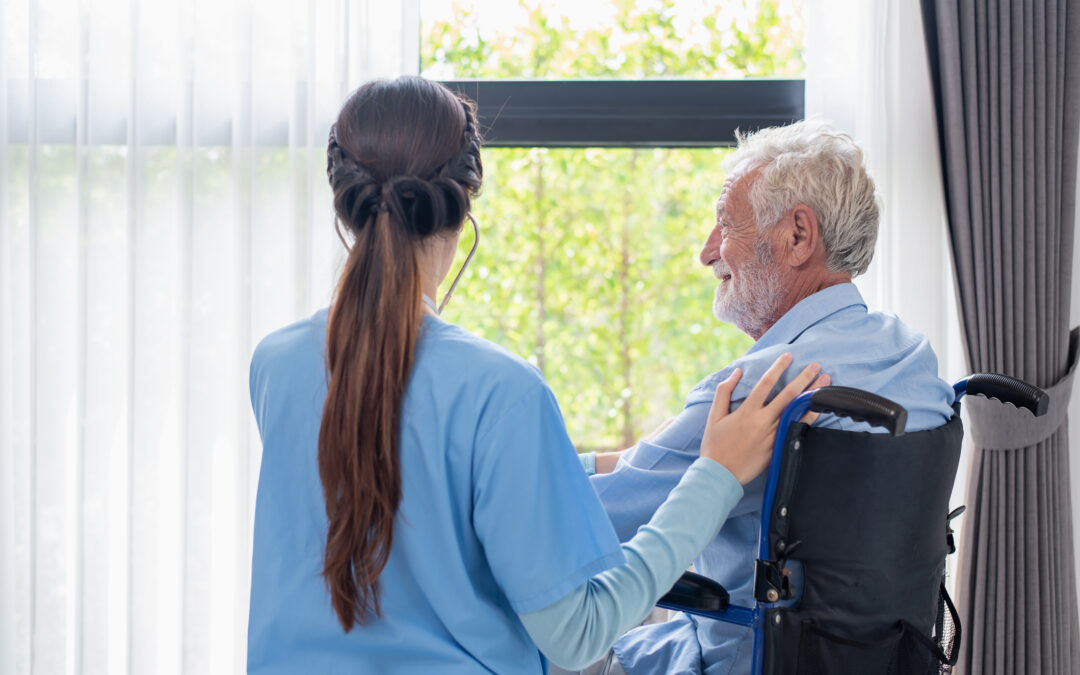 Nurse helping elderly man with seasonal Sundowner's-syndrome